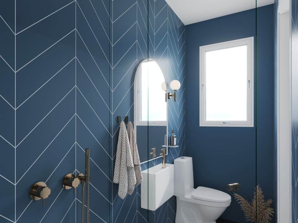 Fibo dusty blue tile-look wall panels in a small bathroom