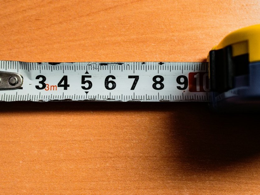 Tape measure used to measure a kitchen for new cabinets