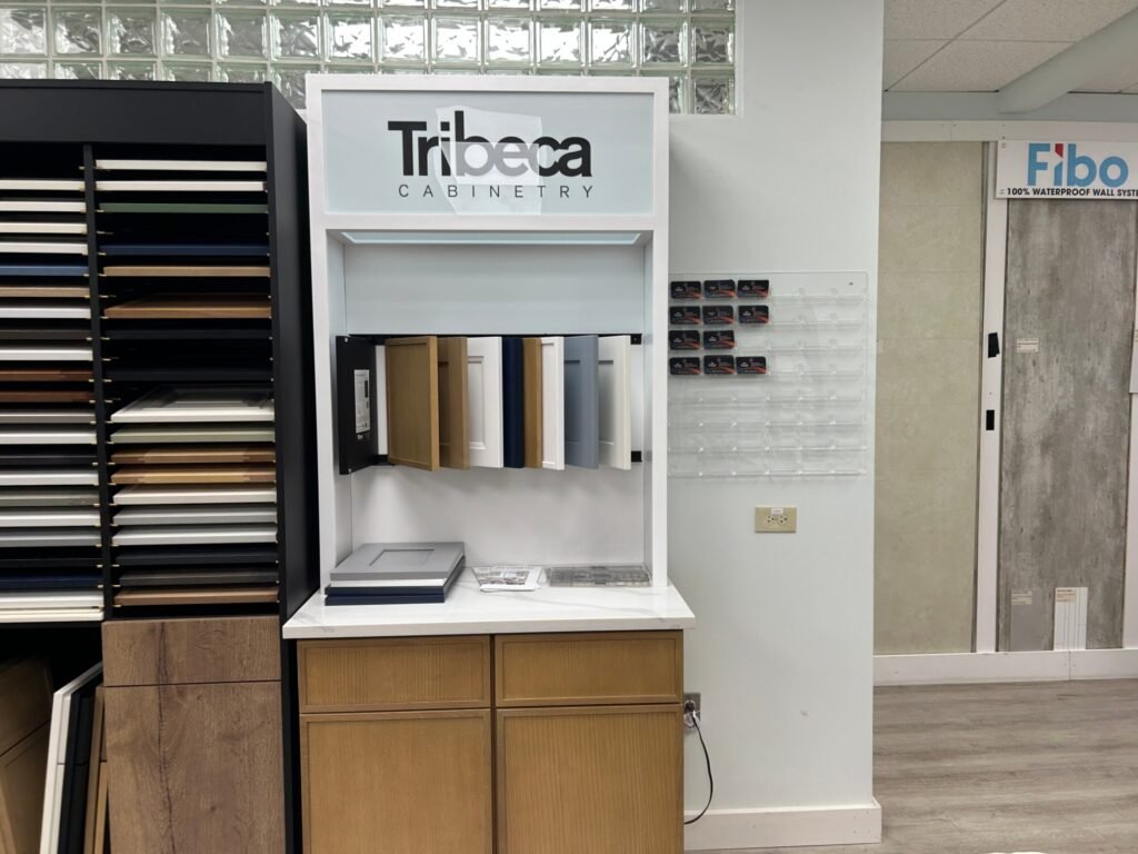 Showroom displays at Land of Cabinets with Fibo panels in the background