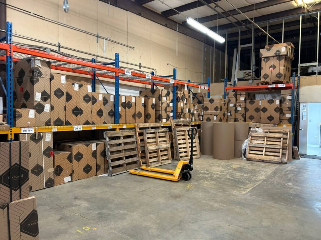 Fabuwood cabinet boxes on warehouse racking at Land of Cabinets in Richmond