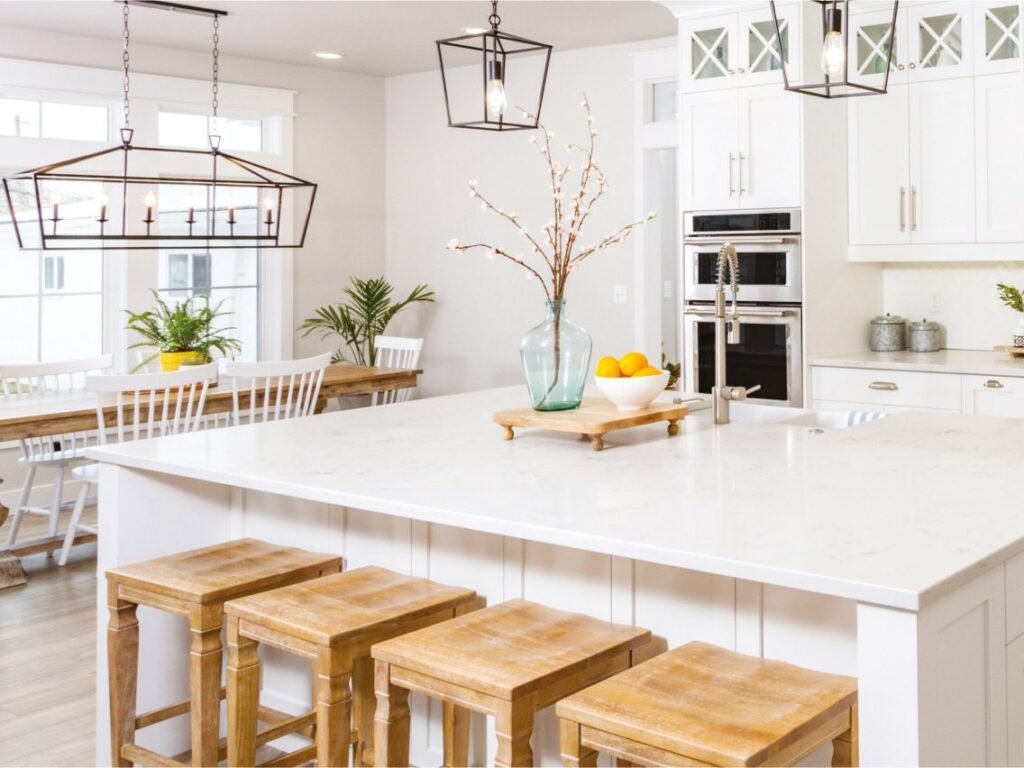 MODA Signature Collection white quartz island in a bright kitchen
