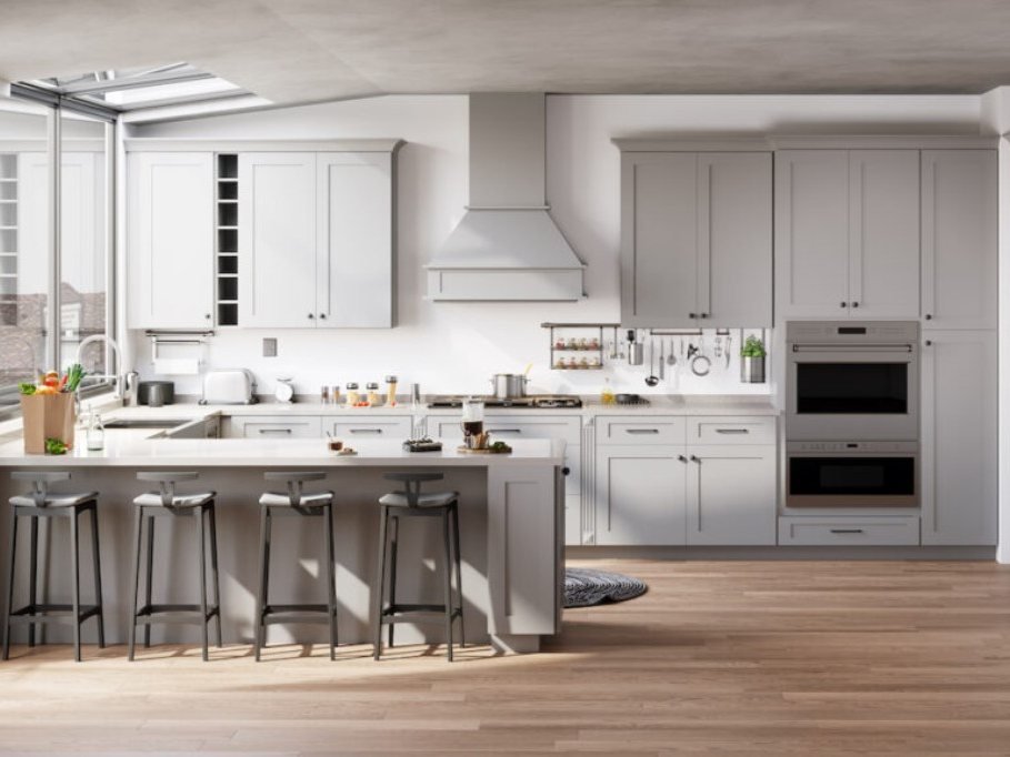 Wellkraft Sierra Gray shaker kitchen with a peninsula and stainless range hood